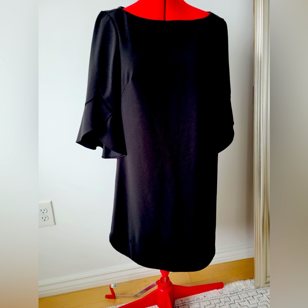 Classic LBD with A-line cut and modern flutter sleeve